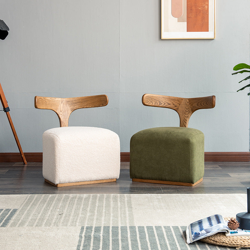 Fauteuil design bas en bois et tissu