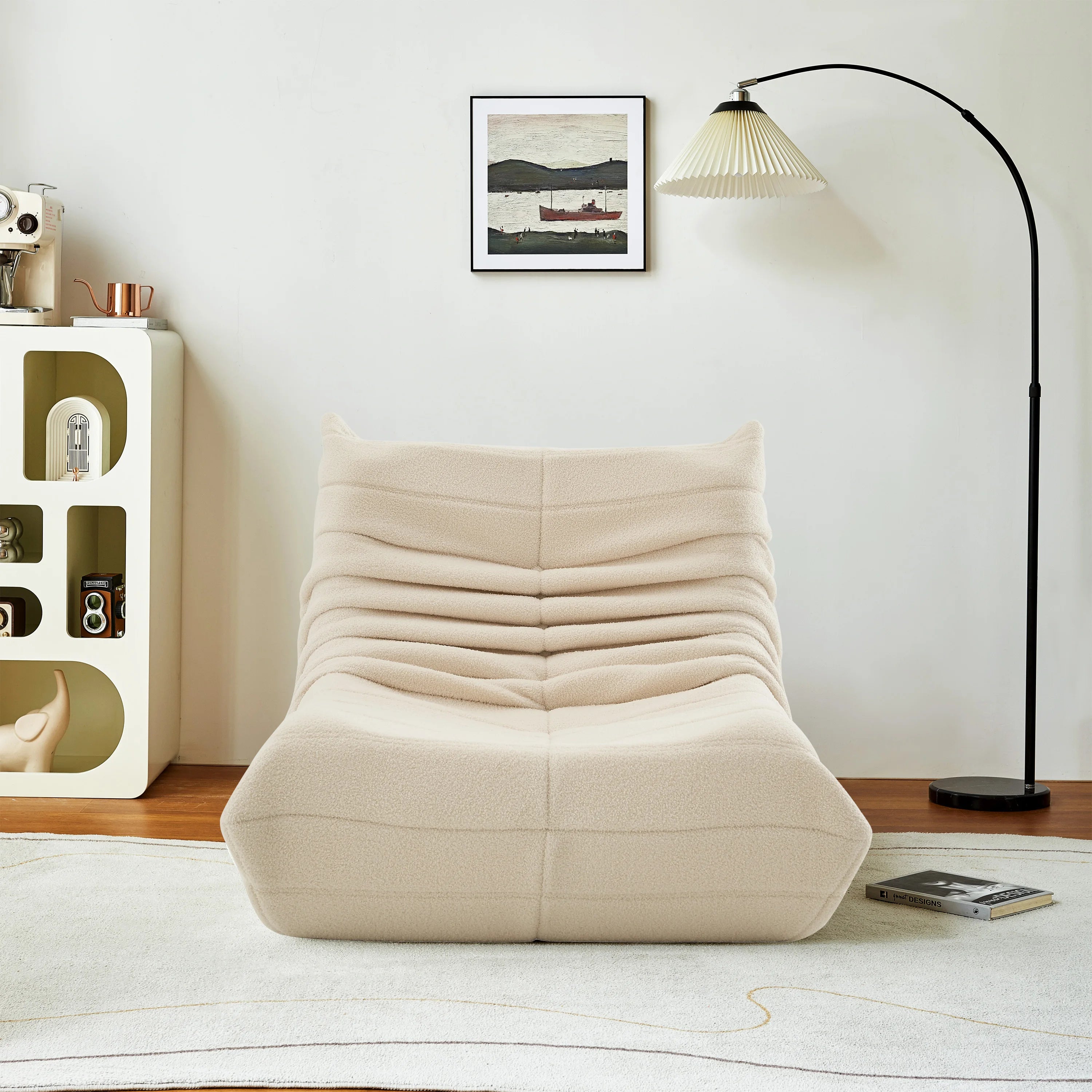 Fauteuil bas en velours bouclette