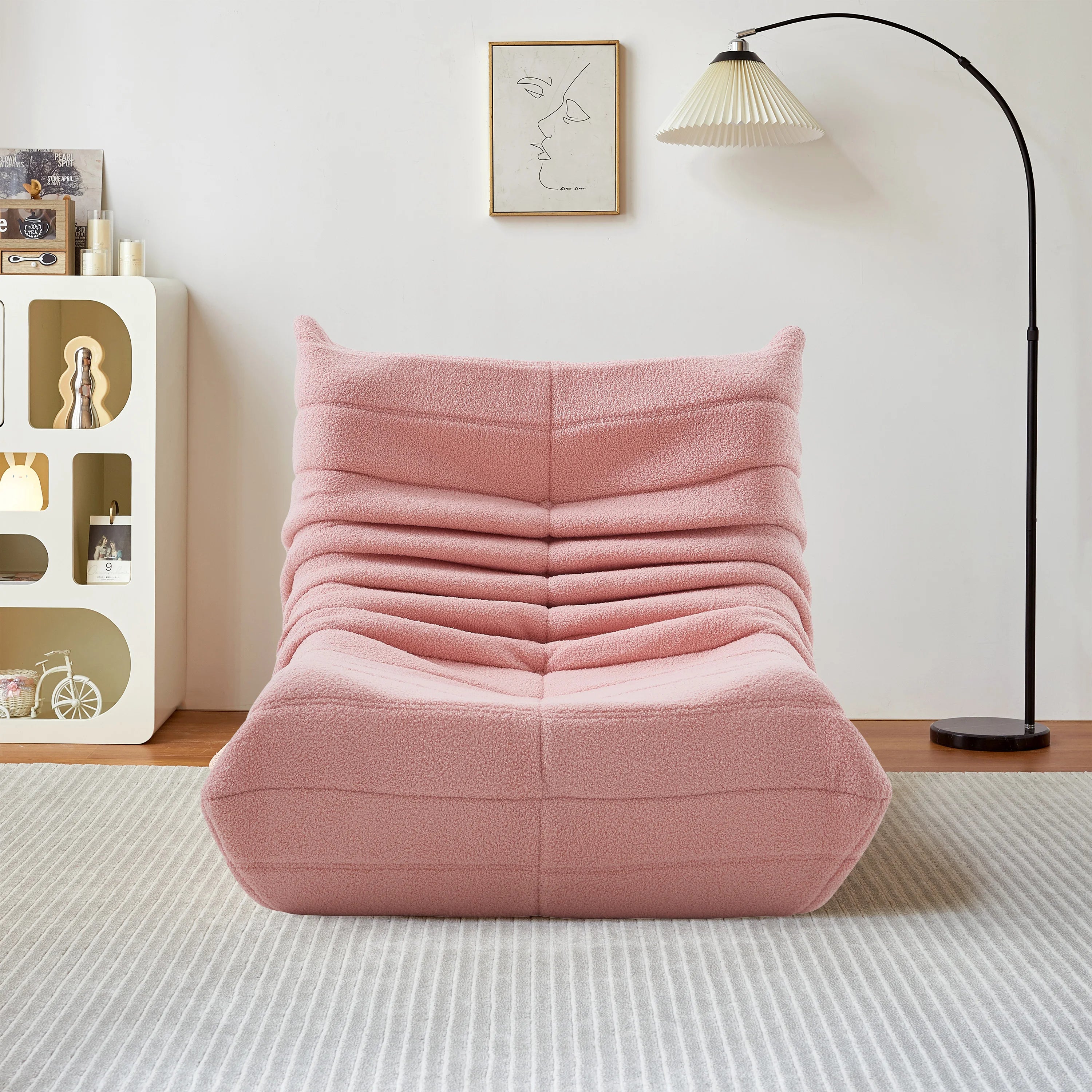 Fauteuil bas en bouclette autoportant
