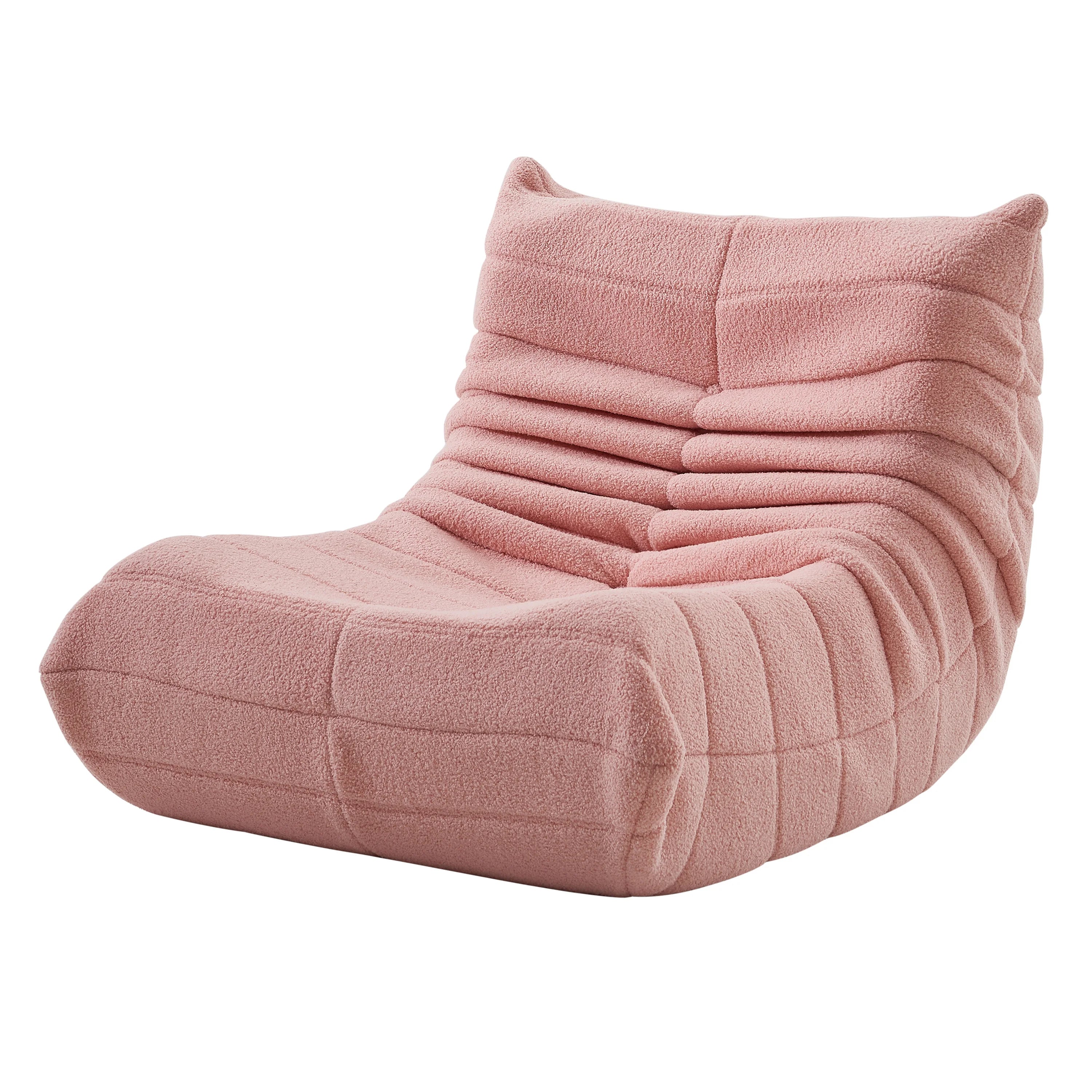 Fauteuil bas en velours bouclette